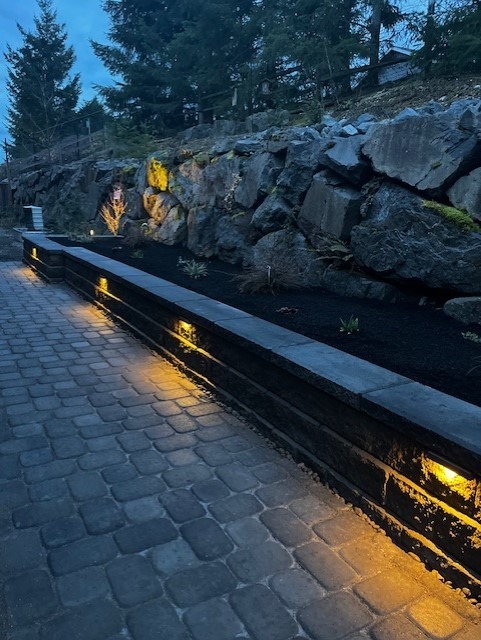 A beautifully illuminated walkway adorned with twinkling lights, creating a warm and inviting atmosphere.